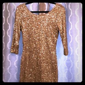 Gold open back cocktail dress